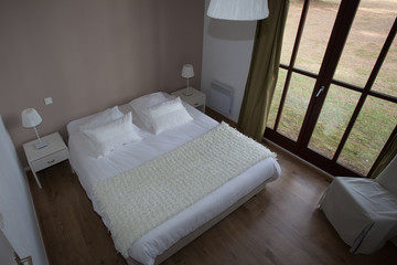 Bedroom interior in a beautiful bright house