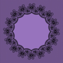 Round black lacy frame on violet background.