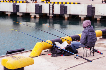 Fototapeta premium fishing in the sea port of Sochi.