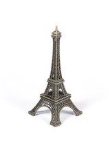 Fototapeta na wymiar Little Toy Eiffel Tower On White Background