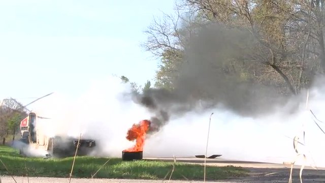 U.S. Marines And Navy Seals Conduct A Simulated IED Explosion Incident Along A Highway.