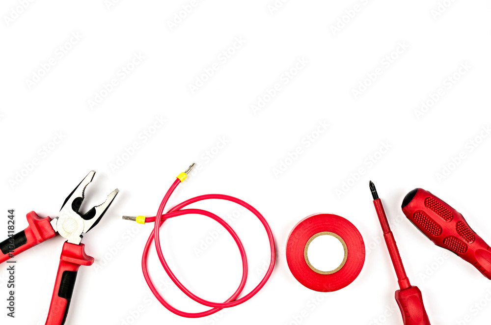 Wall mural red tools collection - electrical cable, pliers, insulating tape