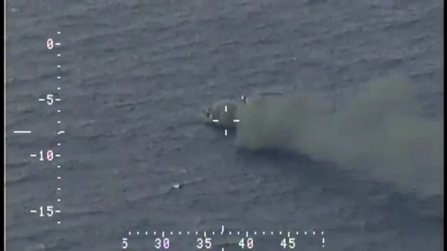 A dramatic high seas rescue by the Coast Guard of passengers from a burning ship.