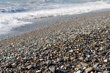 A rocky beach on the Black Sea in Batumi, Georgia.