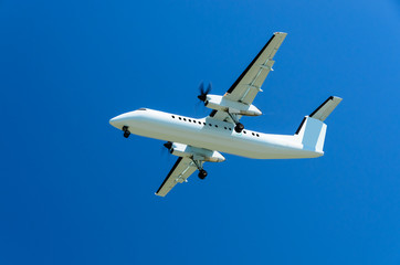 airplane isolated on blue sky background