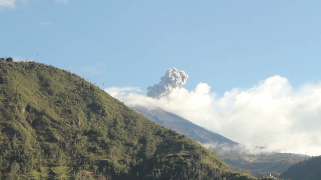 A volcano erupting with smoke. Shot in Banos, Ecuador.
