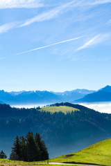 Swiss alps skyline view in cloudscape and blue sky