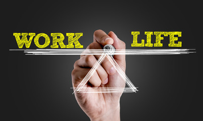 Hand writing the text: Work Life Balance
