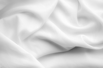 White cloth background abstract with soft waves.