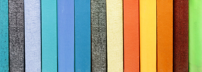Close-up of title-less books in bookshelf