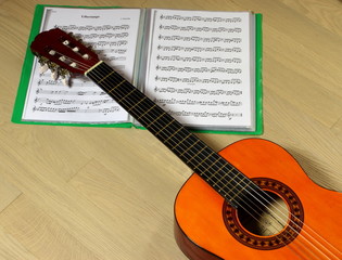 Fototapeta na wymiar classical guitar with music score