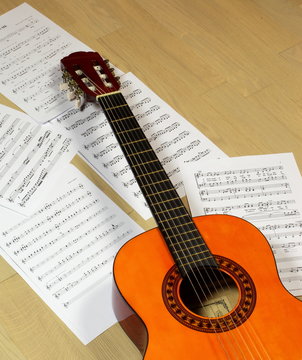 classical guitar with music score