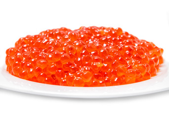 Red caviar on plate on white background