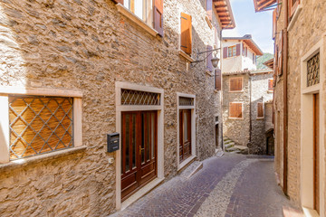 Picturesque small town street view in Limone, Lake Garda Italy.