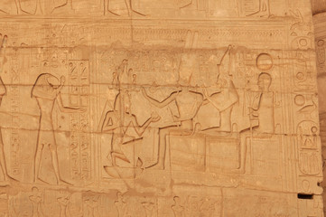 Fototapeta na wymiar Osiris, Isis and Ramses II, bas relief