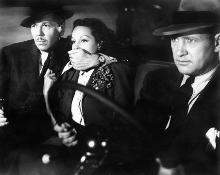 Woman being kidnapped by two men 