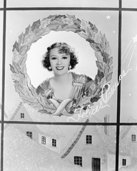 Image of a woman in a holiday wreath 