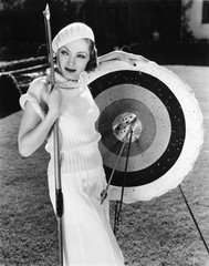 Female archer with bulls eyes 