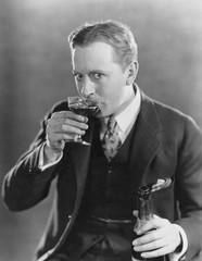 Portrait of man drinking 