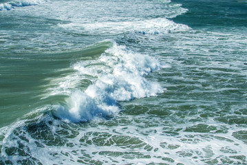 Fototapeta premium Turbulent water of breaking ocean waves