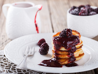 Pancakes with BlackBerry jam.selective focus.