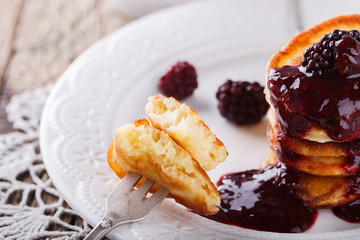 Pancakes with BlackBerry jam.selective focus.