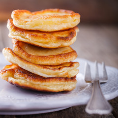 Pancake folded stack on wooden background.selective focus.