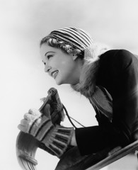 Closeup of woman at front of toboggan 