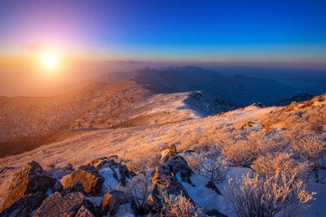 Obraz premium Sunrise on Deogyusan mountains covered with snow in winter,South