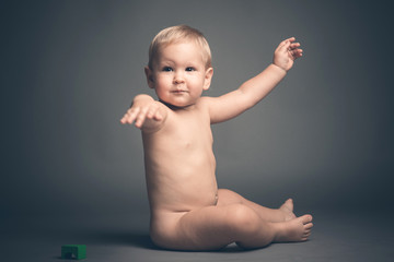 Naked cute caucasian baby boy