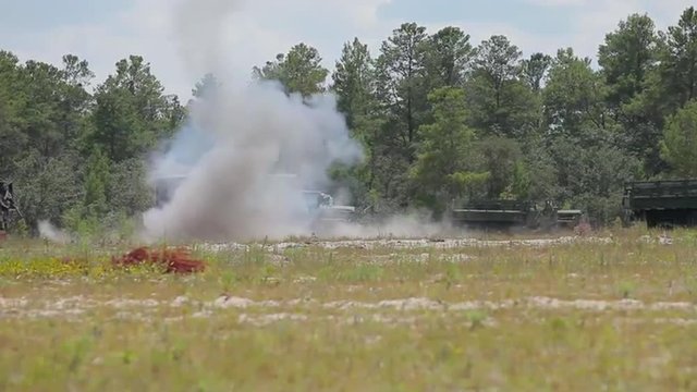 Marines and army soldiers learn to fire shoulder fired weapons.