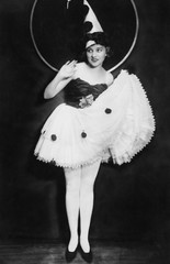Portrait of woman in costume with clown hat 