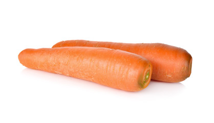 unpeeled fresh carrot on white background