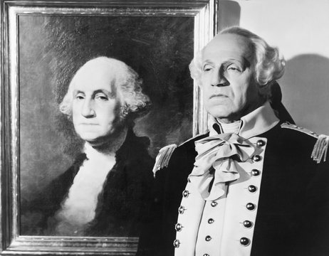 Portrait Of George Washington With An Impersonator Next To The Image 