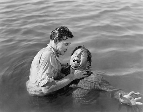Man trying to drown and kill a man 