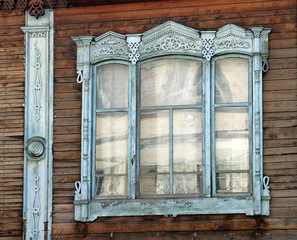 window with an ornament. russian house wooden

