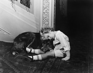 Sleeping child with dog 