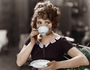 Portrait of woman drinking from teacup  