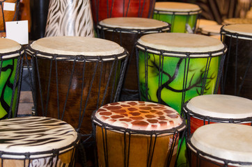 Fototapeta na wymiar Many colorful bongos drums with Spanish and African theme paint decorations