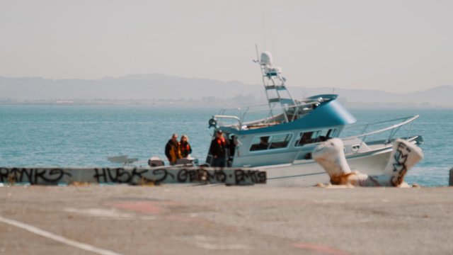 Fisherman's Boat driving off Pier 