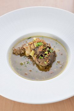 Oxtail Soup on a white bowl