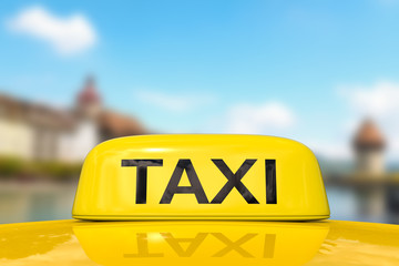 taxi for traveling with cityscape background