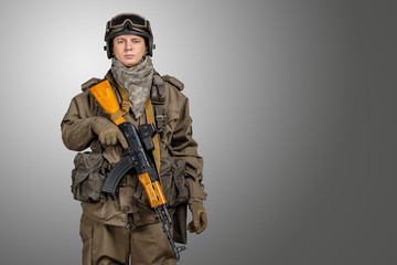 Soldier with rifle and mask