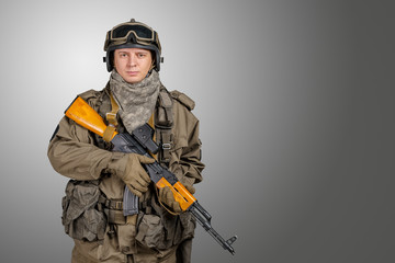 Soldier with rifle and mask