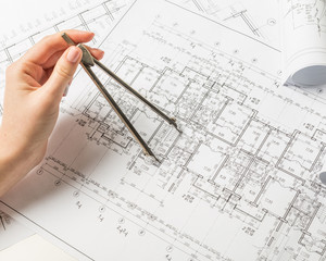 Architect working on blueprint