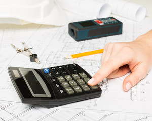 Architect working on blueprint