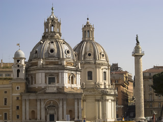 Fototapeta na wymiar View of the two domes of the Church of Santa Maria di Loreto and Colonne Trajane. Rome, Italy.