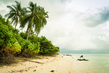 Pantai Tanjung Gelam, a white sandy beach on the island of Karimunjawa, Indonesia.