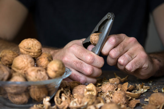 Man cracking nuts