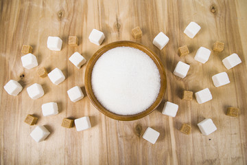 Sugar in a wooden bowl